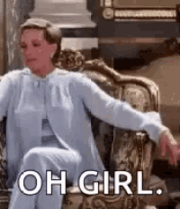 a woman is sitting in a chair with her arms outstretched and the words `` oh girl '' written on her face .