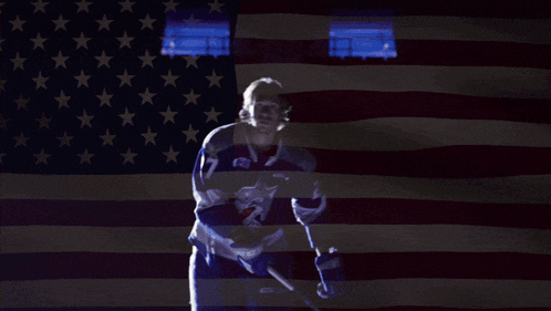 a blurry picture of an american flag with a globe in the background