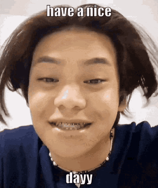 a man with braces on his teeth says have a nice day