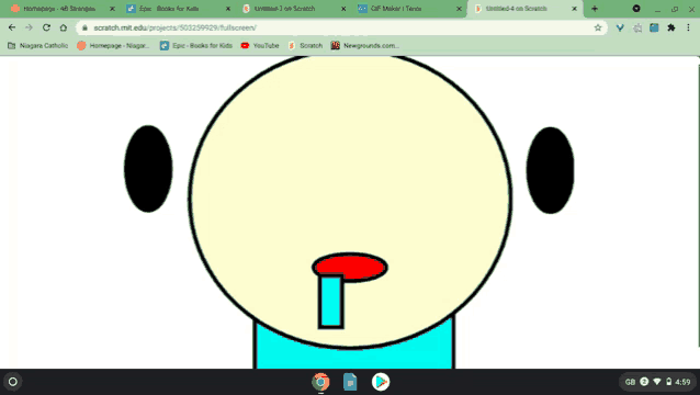 a computer screen shows a cartoon face with a red nose and a blue tongue
