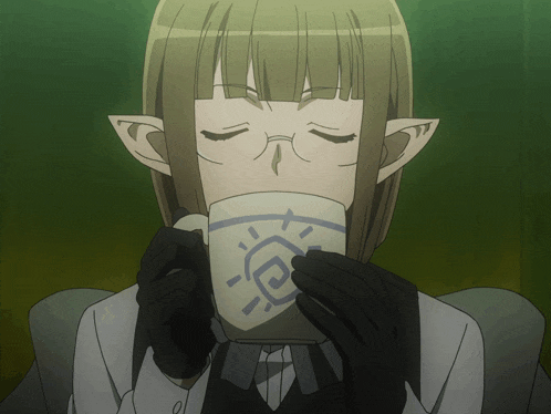 a girl with glasses is drinking from a white cup with a blue circle on it