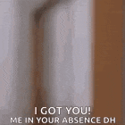 a person is standing in front of a door and saying `` i got you me in your absence dh '' .