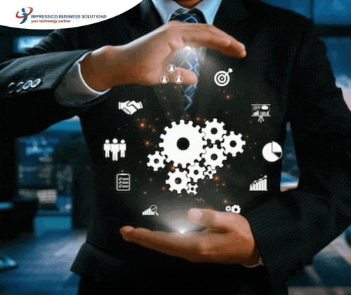 a man in a suit and tie holds gears and icons in his hands in front of an advertisement for impressico business solutions