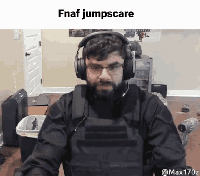a man wearing headphones and a vest with the words fnaf jumpscare above him