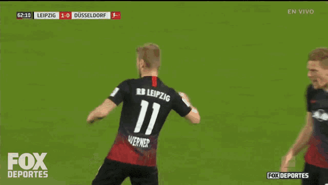 a soccer player with the number 11 on the back of his shirt