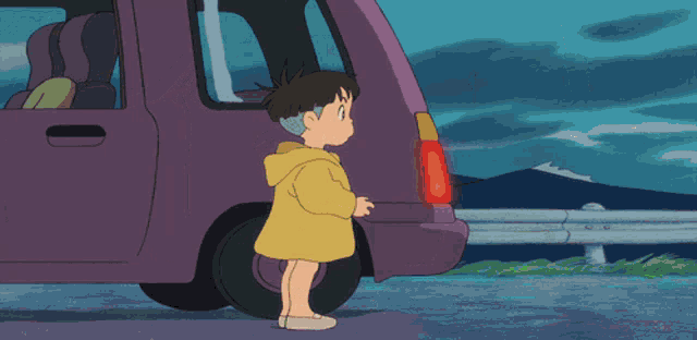 a little girl in a yellow coat is standing next to a purple car