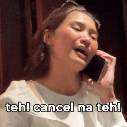 a woman is talking on a cell phone and says teh cancel na teh
