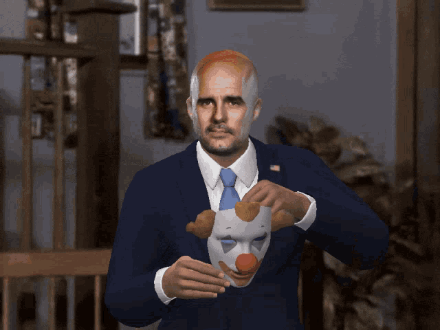 a man in a suit holding a clown mask