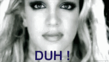 a close up of a woman 's face with the words duh written below her