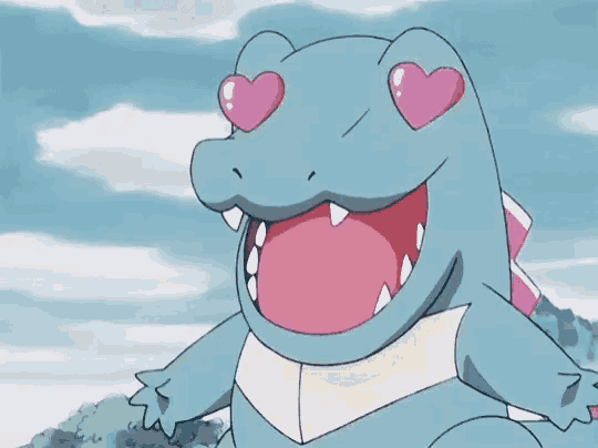 a cartoon alligator with pink heart shaped eyes and a mouth open .