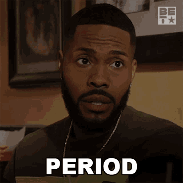 a man with a beard is making a funny face and says period