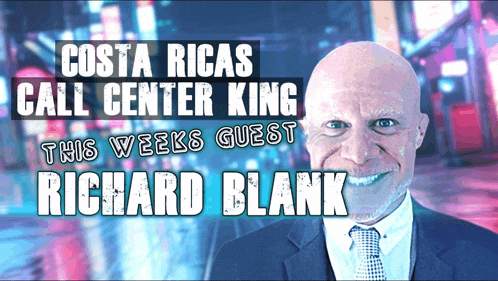 a man in a suit and tie is smiling in front of a costa rican call center king sign