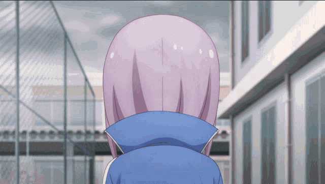 a girl with purple hair and a blue jacket stands in front of a building