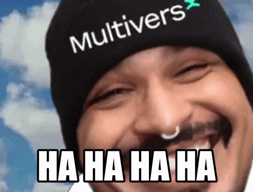 a man wearing a hat that says multivers on it is laughing