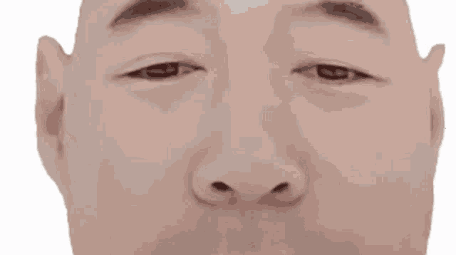 a closeup of a man 's face with a striped background