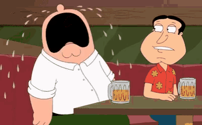 two cartoon characters sit at a table with beer mugs