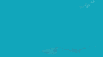 a woman is swimming underwater in a blue pool .