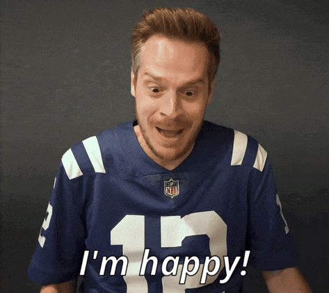 a man wearing a jersey that says i 'm happy on it