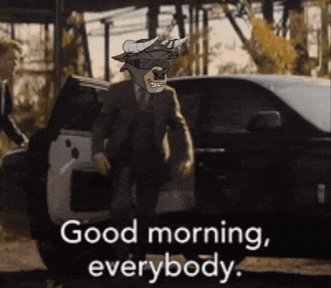 a man in a suit and horns is getting out of a car and says good morning everybody
