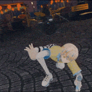 a girl in a yellow shirt is laying on the ground with her hand outstretched