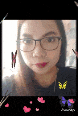 a woman wearing glasses is surrounded by hearts and butterflies