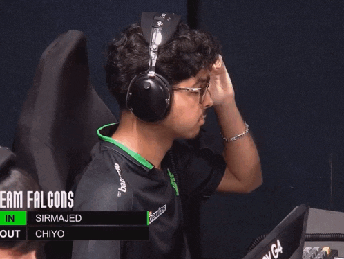 a man wearing headphones with the name sirmajed on the bottom