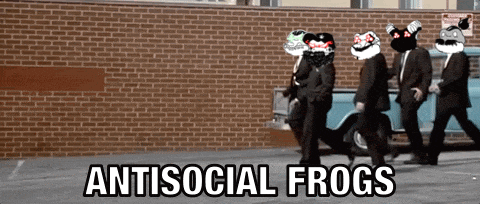 a group of men are walking in front of a brick wall with the words antisocial frogs