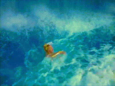 a person is swimming in a pool of water