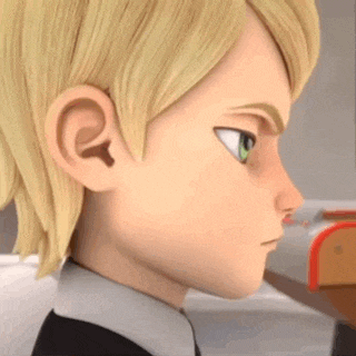 a close up of a cartoon character 's face with blonde hair and green eyes looking at something .