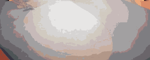 a pixelated drawing of a person laying on a bed