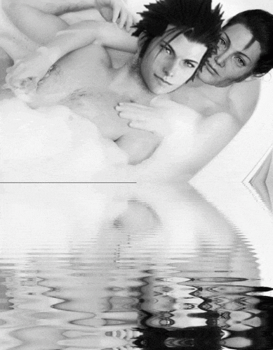 a couple laying in a bathtub with a reflection of them in the water