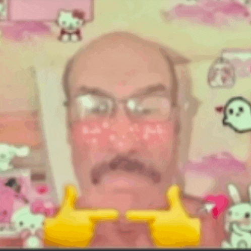 a bald man with glasses and a mustache is making a funny face with his hands .