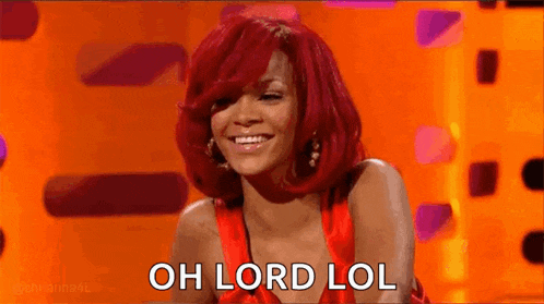 a woman with red hair is smiling and saying `` oh lord lol '' while wearing a red dress .