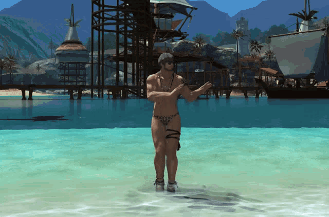 a man without a shirt is standing in the water