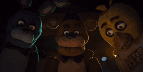 freddy bear bonnie and chica from five nights at freddy 's look at the camera