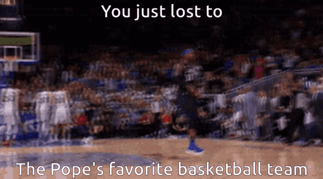a blurry picture of a basketball game with the words you just lost to the pope 's favorite basketball team
