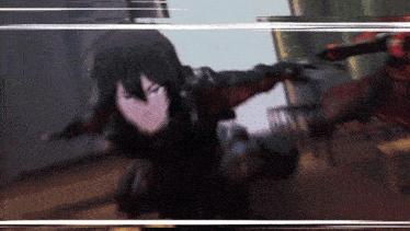 a blurred image of a person with a sword in their hand