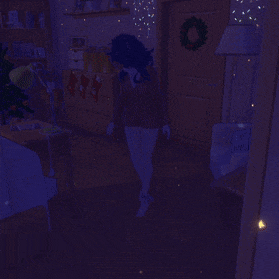 a girl is laying on the floor in a room with a christmas tree in the background
