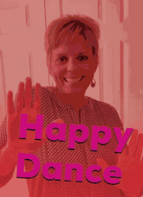 a woman is smiling in front of a yellow background with the words happy dance on it