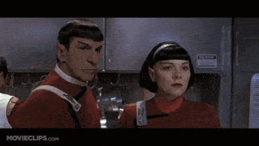 a movie clip from movieclips.com shows two people in red uniforms