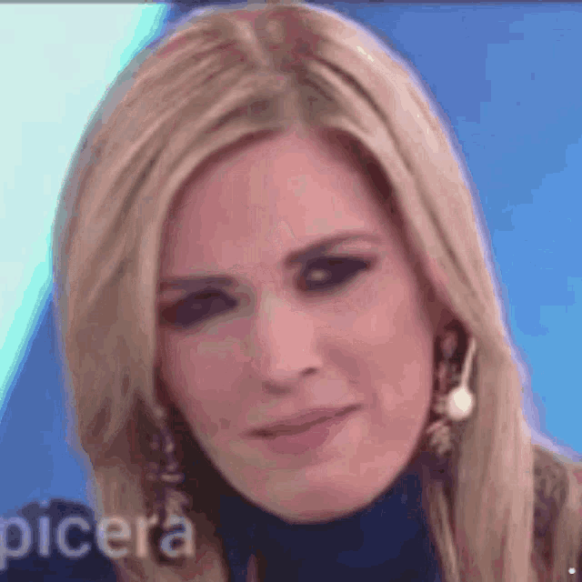 a close up of a woman 's face with the word picera visible in the corner