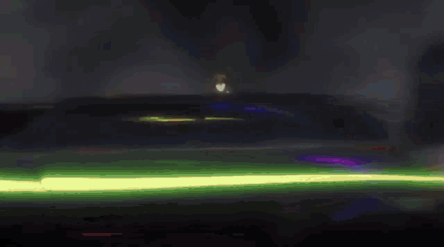 a blurry picture of a man standing next to a white car