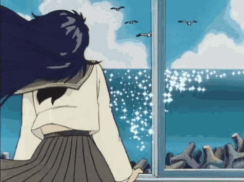 a girl in a sailor suit is looking out of a window at the ocean .