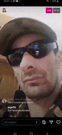 a man wearing sunglasses and a hat is being live streamed