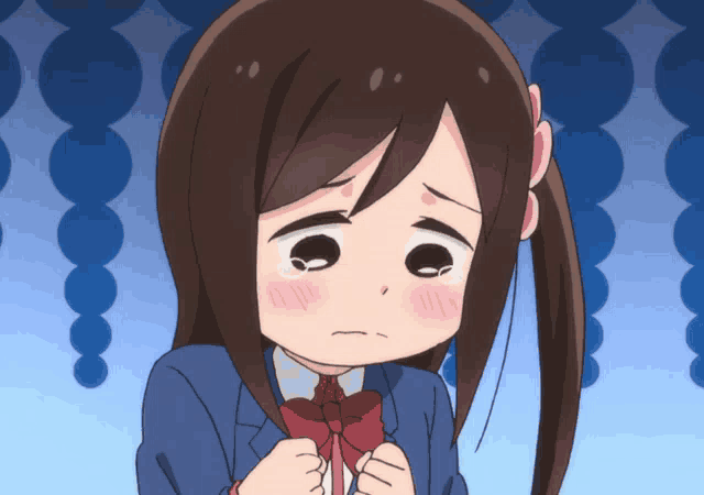 a cartoon girl with brown hair and a red bow tie