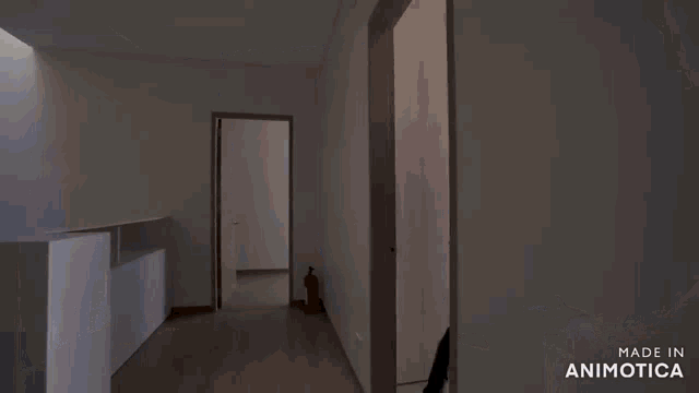 an empty room with the words made in animotica on the bottom right