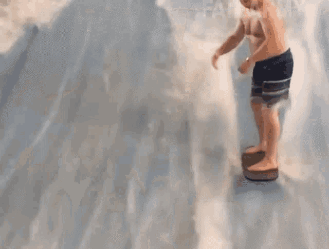 a man is riding a wave on a surfboard in the ocean