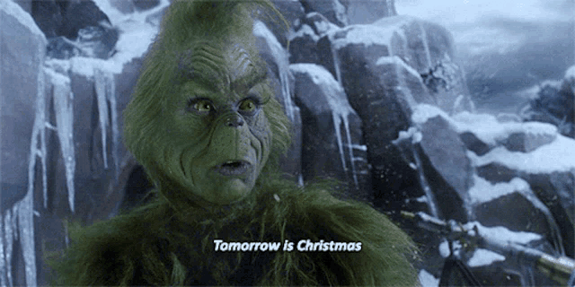 a grinch says tomorrow is christmas in a movie scene