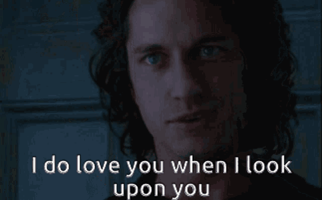 a close up of a man with the words " i do love you when i look upon you "