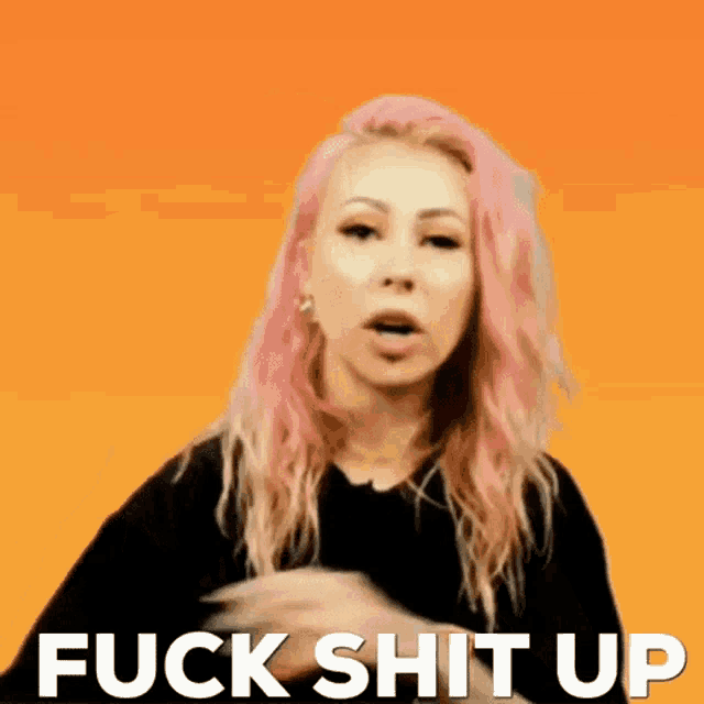 a woman with pink hair says fuck shit up